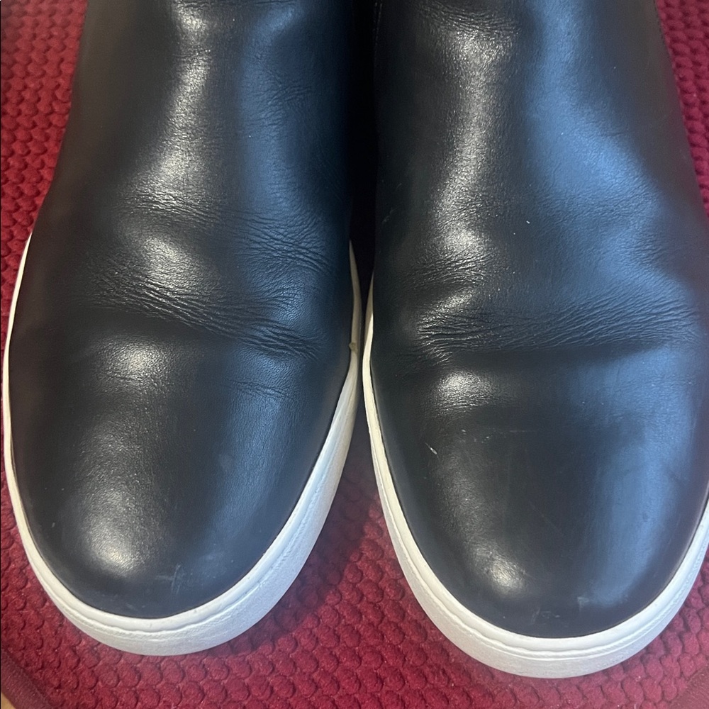 Prada boots. Hand stitched -Black and white leather.